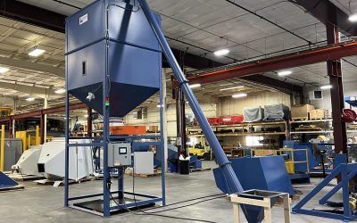 Screw Conveyor and Surge Bin Packout System